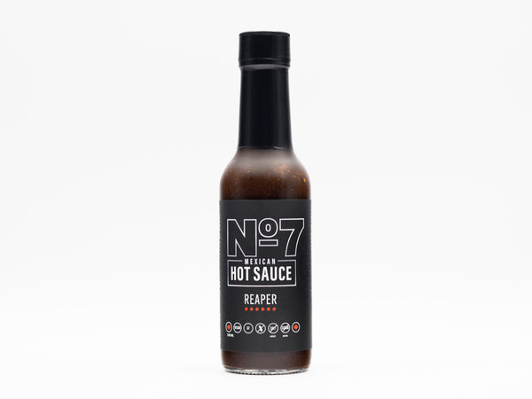 10 year anniversary reaper pepper sauce made with Ontario grown black garlic.